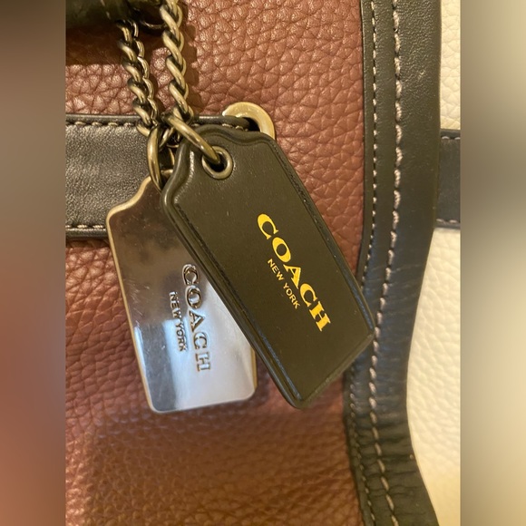 Coach purse  pebbled leather.  Used. Ox blood, cream, black - Picture 14 of 16